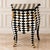 Make a statement this Halloween with this striking French-style decorative commode, featuring a dramatic black-and-white...