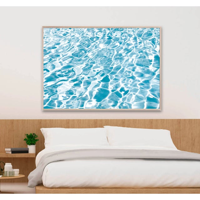 This tropical pool photograph was shot in the sparkly waters of Miami Beach in a light, airy icy blue to cool you down....