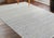 Ivory Ivory Solid Modern Hand-Knotted Wool Rug 6x9 For Sale - Image 8 of 11