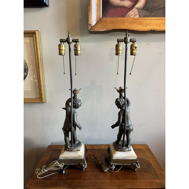 Pair of French Late 19th Century Bronze & Marble Double Socket Table Lamps. 1960s cords in fine condition, operational....