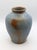 Circa 1980s "Seagrove" Pottery large turned vase by Walter & Dot Auman. An outstanding striated smalt blue with browns...
