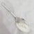 A fine Edwardian sterling silver preserve spoon dating to 1902, displaying elegant decorative craftsmanship characteristic...