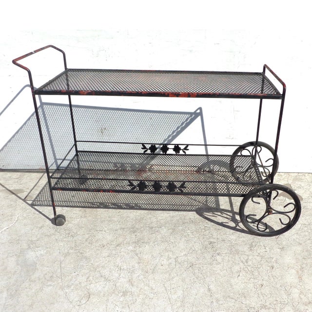 Woodard style wrought iron bar serving cart 2 tier mid-century metal bar cart by Woodard. Wheels for mobility. Measures:...
