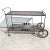 Woodard style wrought iron bar serving cart 2 tier mid-century metal bar cart by Woodard. Wheels for mobility. Measures:...