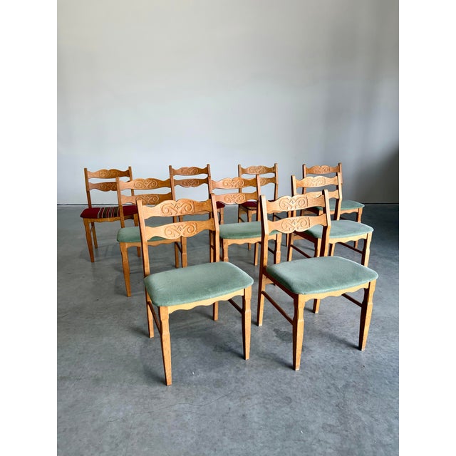 Set of 9 Razor Blade style Carved Oak Dining Chairs attrb to Henning Kjaernulf Denmark c.1960’s. Constructed of solid...