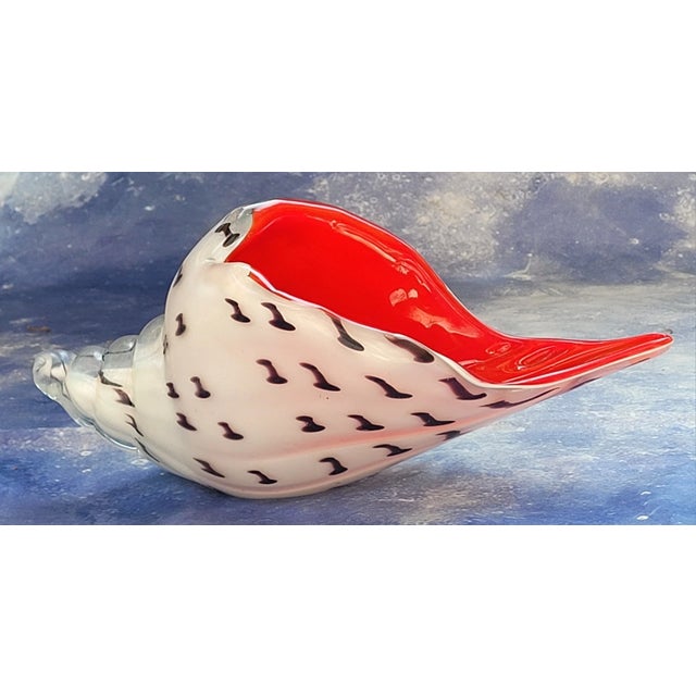Bring the beauty of the sea into your home with this **vintage Murano-style art glass conch shell figurine**. Expertly...