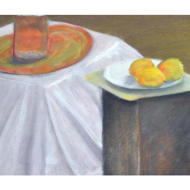 Still life of an interior with lemons and draped cloth by James Pollock (American, 20th Century). Signed and dated "Jim...