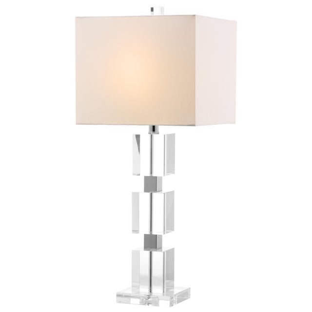Three graphic blocks of crystal form the striking base of the Ice Palace crystal cube lamp. A stately piece that...