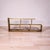 This striking vintage bookshelf blends the clean lines of Mid-Century Modern design with the organic warmth of live edge...