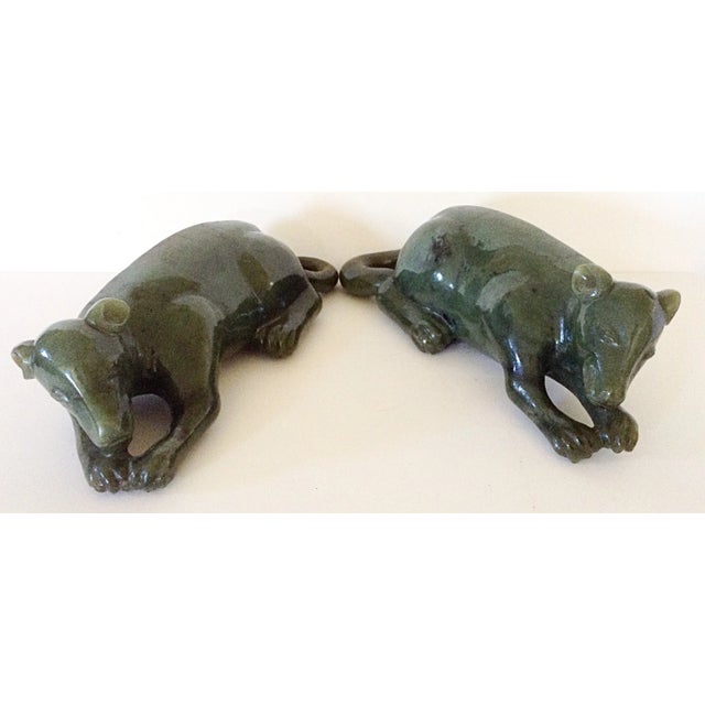 This pair of jadeite reclining rats are carved in the mirror image of each other and have lovely brown veining accenting...