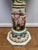 Elegant and highly decorative, this vintage Italian Capodimonte porcelain pedestal showcases the ornate craftsmanship the...