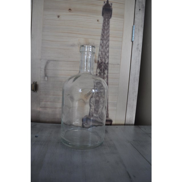 Vintage wine bottle Color: clear Materials: Glass Condition: Good, wear consistent with age and use Care instructions hand...
