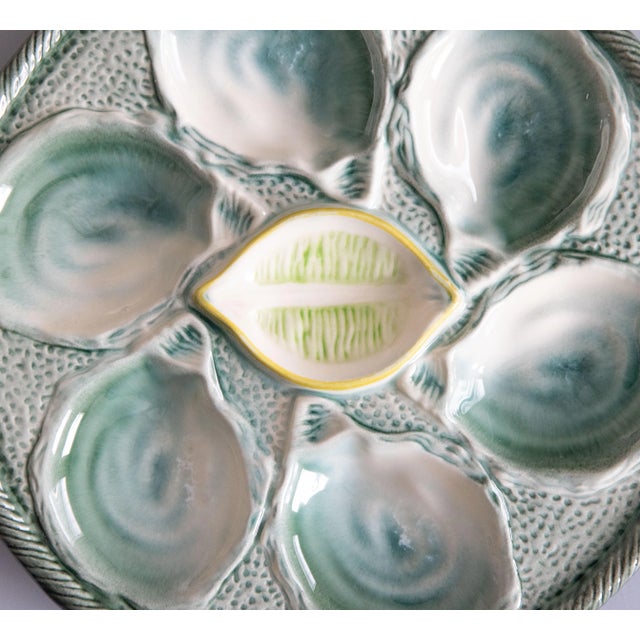 A lovely antique French majolica trompe l'oeil oyster plate made at the famous St. Clement faience factory in the East of...