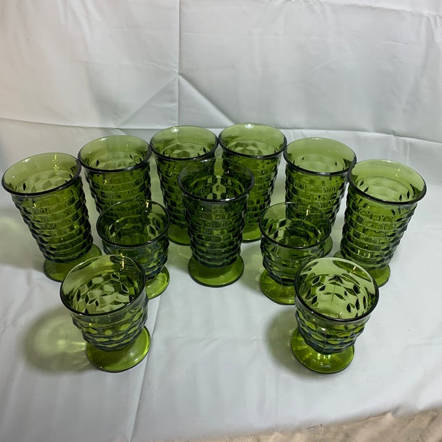 Enhance your drinkware collection with this stunning set of eleven vintage green tumbler glasses. The glasses are perfect...