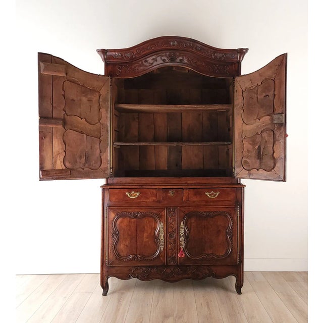 A Normandy walnut buffet deux corps, France circa 1780.