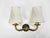 This exquisite pair of two-armed wall lights exemplifies the elegance of Viennese Modernism from the 1940s, designed by...