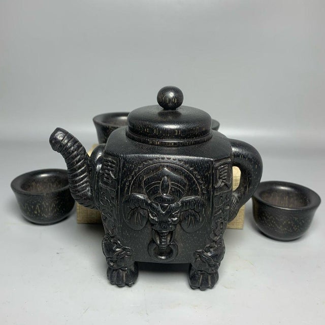 Textile Late 19th CenturyCarved Faux Horn Elephant Teapot Set With Four Cups and Box For Sale - Image 7 of 9