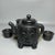 Textile Late 19th CenturyCarved Faux Horn Elephant Teapot Set With Four Cups and Box For Sale - Image 7 of 9