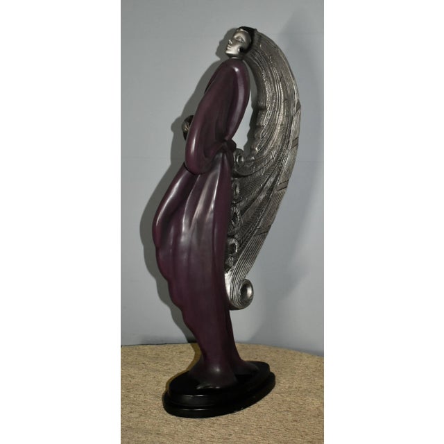 Vintage (1980s) Statue/Figure has an Art Deco Style. Made by Austin/LeClere. The Statue is Metal. It's Signed. The...