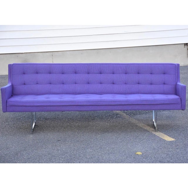 A mid century modern vintage sofa with a beautiful purple fabric and chrome base by Patrician Furniture. This sofa is...