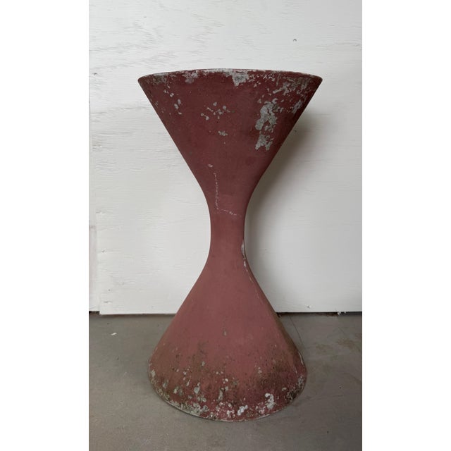 Bring iconic mid-century design into your space with this striking planter. This sculptural piece is a timeless example of...