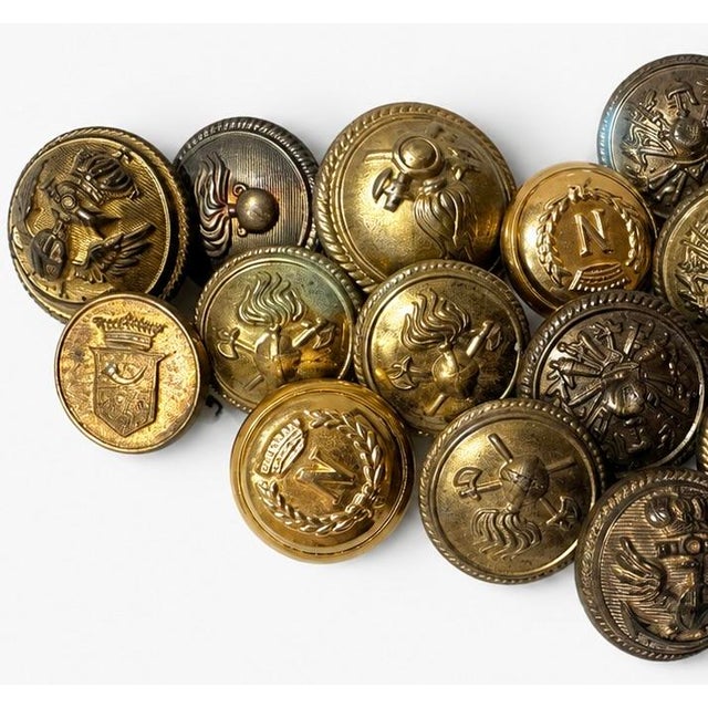 A curated collection of authentic vintage Italian military uniform buttons sourced in Florence, Italy. This mixed lot...