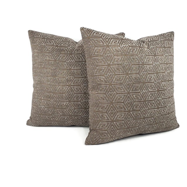 From F. Schumacher is COSMATI CHENILLE in the color smoke. A sophisticated geometric pattern in shades of gray and brown....