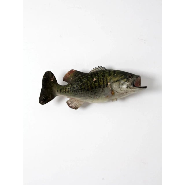 This vintage largemouth bass wall mount features a realistic taxidermy-style presentation with detailed form and natural...