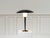 A striking vintage desk lamp designed by Jean-Boris Lacroix and produced by Caillat around 1950, recognizable by its...