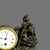 A charming and highly decorative French figural mantel clock dating from the late 19th century, combining sculptural...