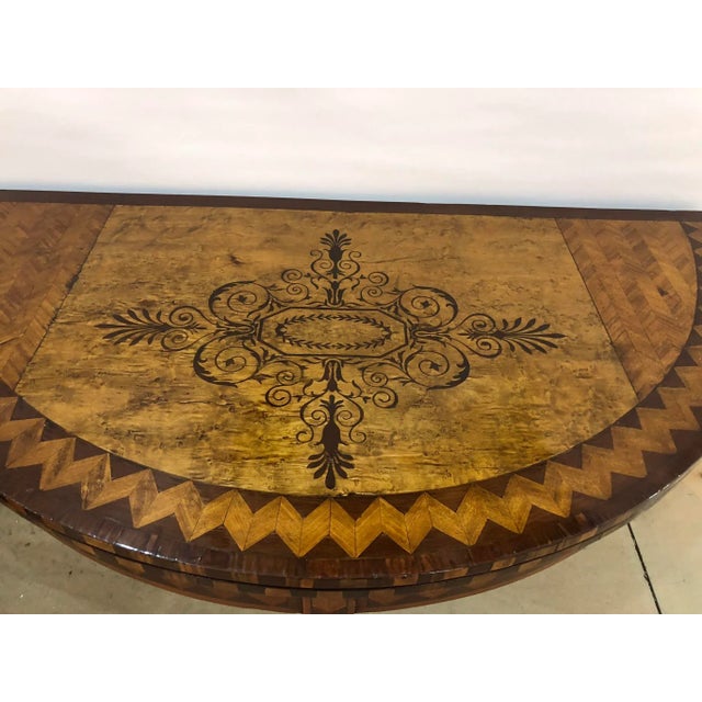 Late 18th/ early 19th Century English Card Table with a beautiful inlaid top. The inland top features a birds eye maple...