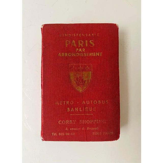 A vintage Paris Arrondissement Guidebook, France, 1974. A petite 1970s Paris arrondissement guidebook published by...