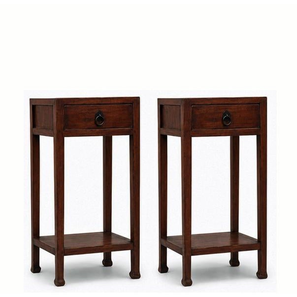 This pair of elegant Asian table is handmade of solid elm. With a single drawer and four elegantly shaped legs ending in...