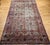 Early 20th century oversize Persian Kerman Lavar in an allover floral pattern. This rug features a graceful and peaceful...
