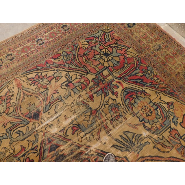 Origin: Persian Circa: 1880 Material: wool pile on cotton foundation Weaving technique: Hand knotted Size: 10"6"x 14'10"...