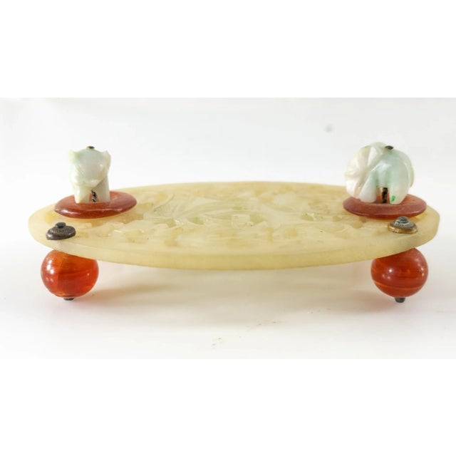 We are selling this cool soapstone and jadeite elephant desk accessory in the manner of Edward Farmer. Condition: Missing...