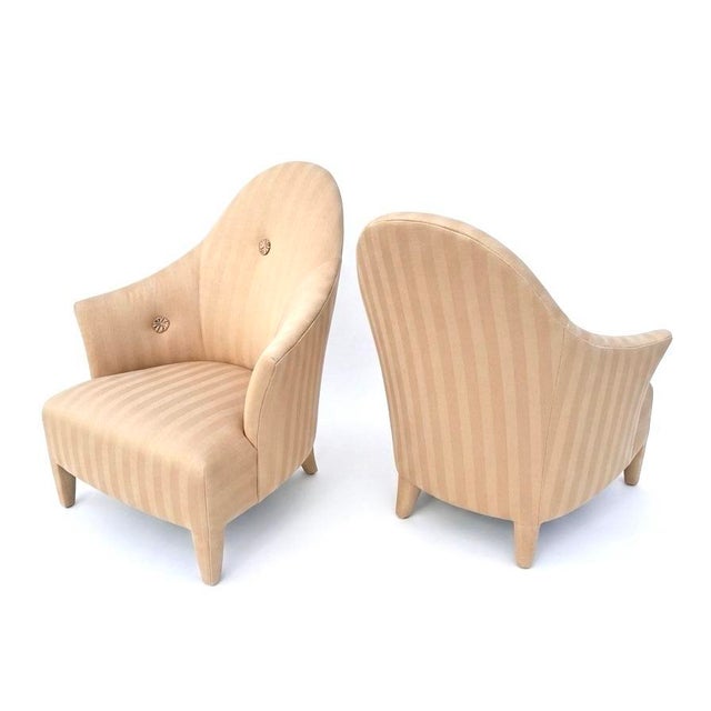 Iconic John Hutton for Donghia Phantom / Ghost chairs, fully covered in a striped upholstery with applied rosette...