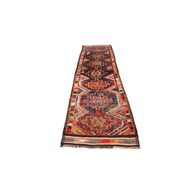 Handknotted vintage decorative Herki runner from Northern Iraq. Approximately 50-60 years old. In very good condition.