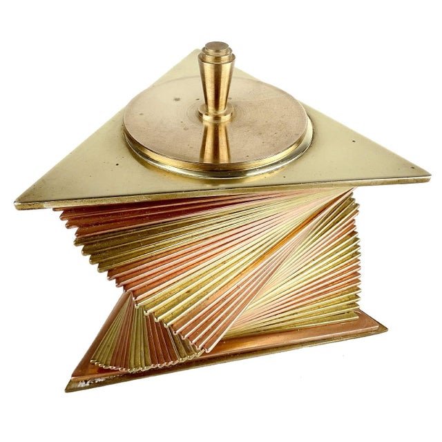 Rare Art Deco brass and copper lidded box designed by John Otar. The box is composed of individual triangular plates...