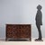 A Baroque walnut chest of drawers from France dating back to the early 18th century, featuring a curved front composed of...