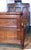 This dramatic, monumental bestead is full of fanciful details including chamfering, incised carving, exotic ebony and...