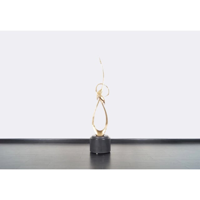 Elegant, sculptural, and undeniably dramatic, this life-size brass crane sculpture by Boris Lovet-Lorski is a true...