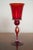 A striking vintage ruby red Murano art glass chalice featuring a tall flared cup, slender stem, round foot, and applied...