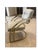 Modern and elegant dining chair with soft neutral upholstery and a gently curved, button-tufted back. The brushed gold...