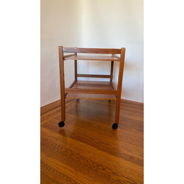 A very stylish teak cocktail cart designed and manufactured by " BRDR. FURBO of Denmark in the 1960s. Great for displaying...