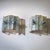 Pair of wall sconces composed of rectangular glass panels arranged in a fan-shaped semicircular formation. The glass...
