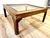 Elevate your interior with this elegant square vintage walnut coffee table, a stunning blend of timeless design and...