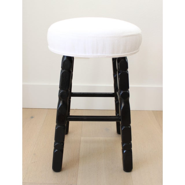 Stylish Mid-century carved stool with newly refinished frame, and repurposed upholstered seat in a soft Belgian linen....
