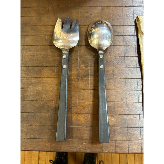 Midcentury modern salad serving fork and spoon in the Town & Country patron by silversmith Allan Adler, (1916-2002)...
