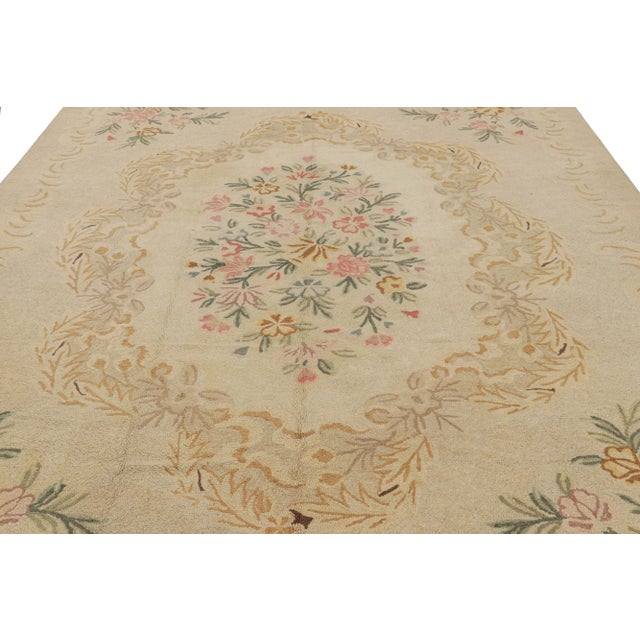 Handmade in wool and originating in China in circa 1940-50, this 9x12 rug is a rare and exciting new curation in Rug &...